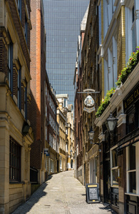 Lovat Lane in the City of London with skyscrapers filling sky