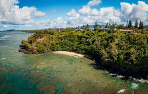 Overhead panorama view of Sealodge beach in Princeville on Kauai