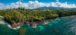 Rugged coastline of Sealodge beach in Princeville on Kauai