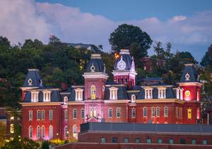 Woodburn Hall illuminated at dusk in Morgantown WV