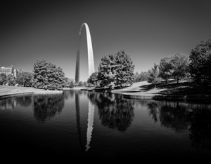 Monochrome Gateway Arch of St Louis Missouri reflecting in the l