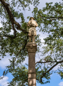 Rear view of statue confederate soldier surrendering in Natchez