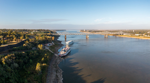 Modern and old river cruise boats docked in Natchez Mississippi