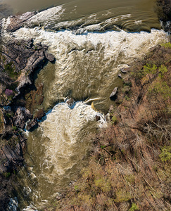 Top down over flooded Valley Falls on a bright spring morning