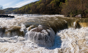 Eye level view of raging flooded Valley Falls near Fairmont