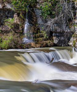 Small waterfall by Valley Falls on a bright spring morning
