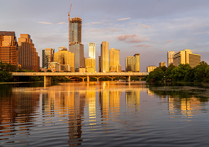 Waterline dominates city skyline of Austin Texas at sunset in 20