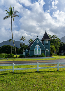 Waioli Huiia Church stands in Hanalei Kauai with the majestic 