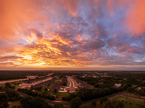 Dramatic sunset seen from drone over Georgetown Texas residentia