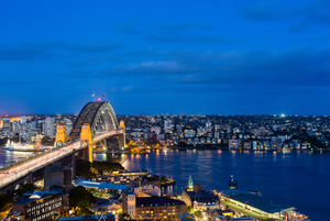 Dramatic panoramic night photo Sydney harbor