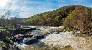 Panorama of flooded Valley Falls on a bright spring morning
