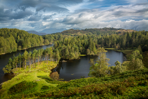 Clouds over Tarn Hows in English Lake District