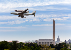 Space Shuttle Discovery flies over Washington DC