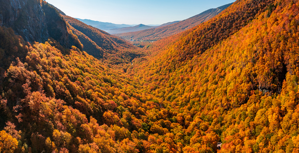 Aerial view of Smugglers Notch with fall trees in Vermont by Steve Heap