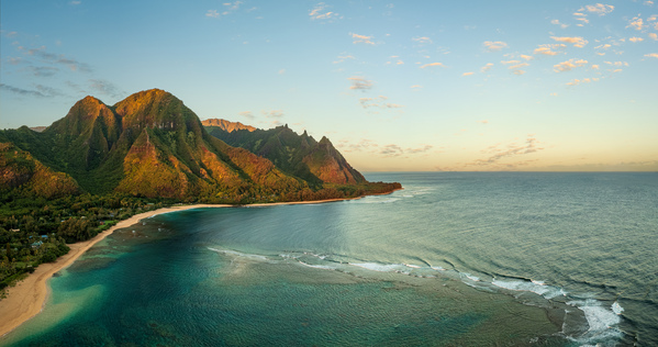 Panorama aerial view of Tunnels Beach at sunrise on Kauai in Hawaii by Steve Heap