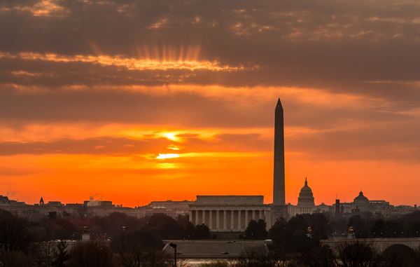 Fiery sunrise over monuments of Washington by Steve Heap