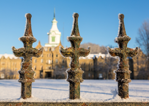 Railings in snow outside Lunatic Asylum by Steve Heap