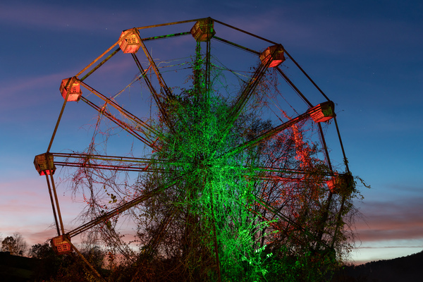 Ferris Wheel ride at abandoned funfair  by Steve Heap