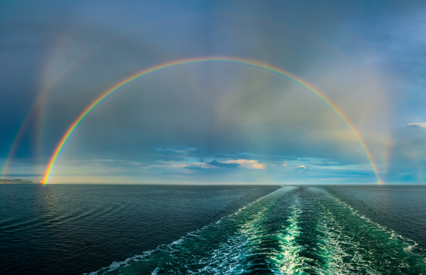 Dramatic double rainbow over wake of ship by Steve Heap
