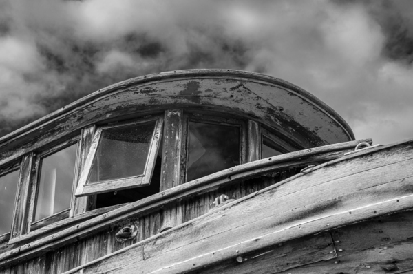 Monochrome abandoned fishing boat at Icy Strait Point by Steve Heap