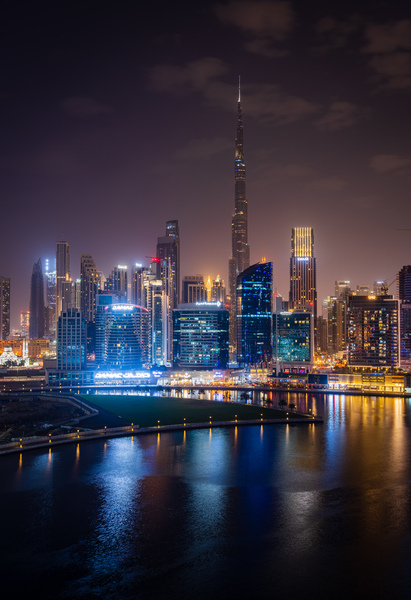 Offices and apartments of Dubai Business Bay with district behin Print