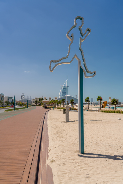 Rubber surface of running track alongside Dubai beach by Steve Heap