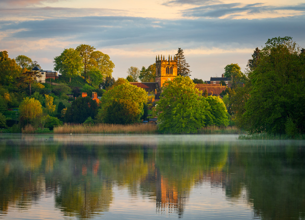 Sunset view across Ellesmere Mere in Shropshire to church by Steve Heap