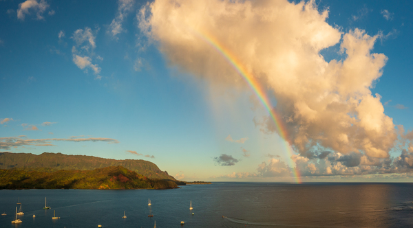 Rainbow over Hanalei bay in panorama across the ocean Print