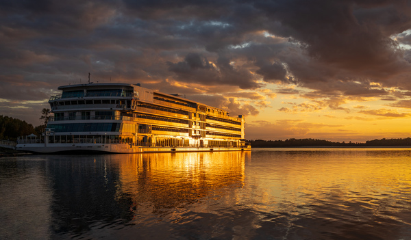 Sunset over Viking Mississippi river  cruise boat near Vicksburg by Steve Heap