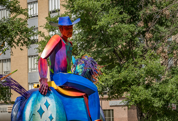 Tracking the end of the rainbow scuplture of cowboy on horse in  by Steve Heap