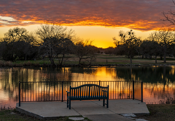 Dramatic sunset over Legacy Hills Park lake and golf course near by Steve Heap
