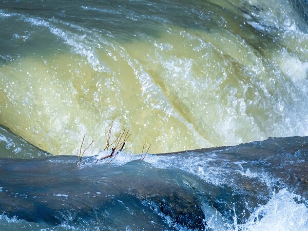 Frozen motion of raging water flowing over Valley Falls by Steve Heap