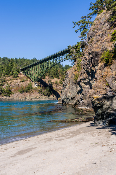 Turbulent water of Deception Pass under historic cantilevered br by Steve Heap