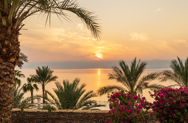 Sun setting behind the West Bank of Israel over Dead Sea by Steve Heap