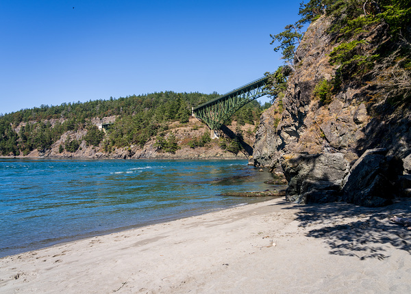 Turbulent water of Deception Pass under historic cantilevered br by Steve Heap