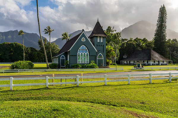 Waioli Huiia Church stands in Hanalei Kauai with the majestic  by Steve Heap
