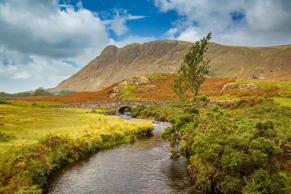 Stone bridge over river by Wastwater Print