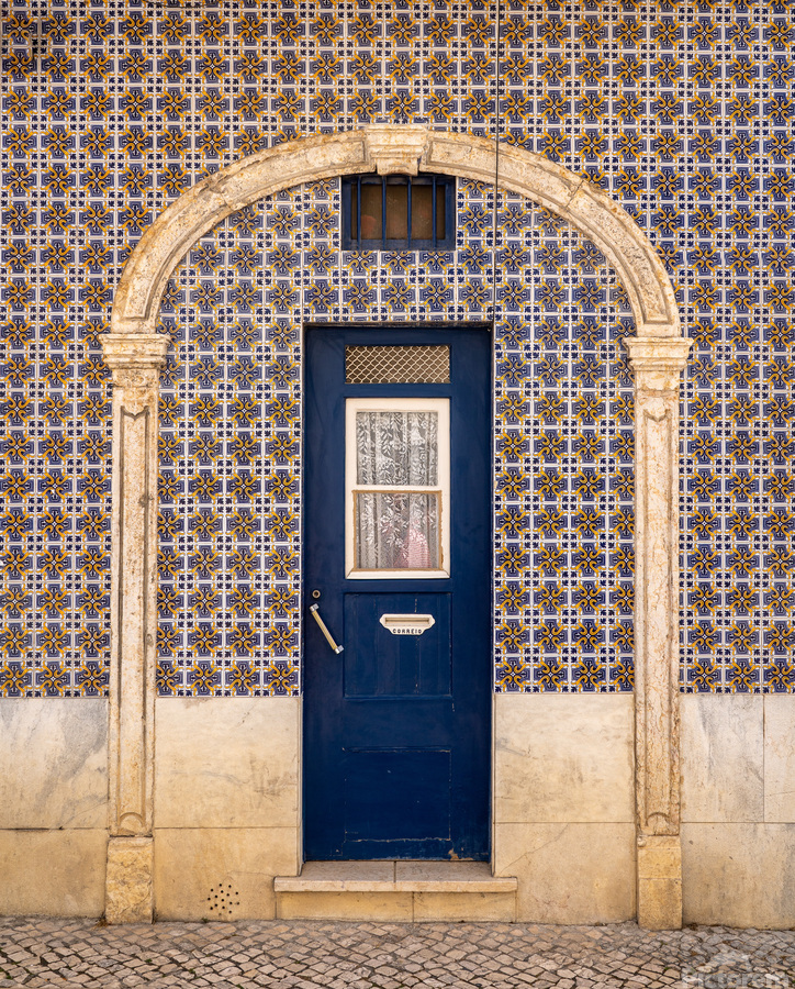 Blue door in ceramic tiled home in Lisbon  Print