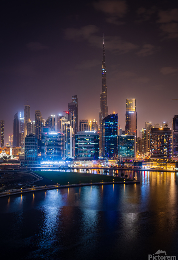 Offices and apartments of Dubai Business Bay with district behin  Print