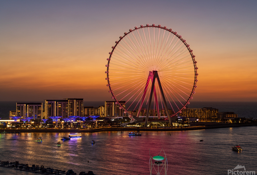 Light show on Ain Dubai observation wheel at sunset  Print