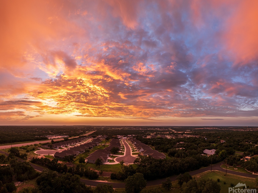 Dramatic sunset seen from drone over Georgetown Texas residentia  Print