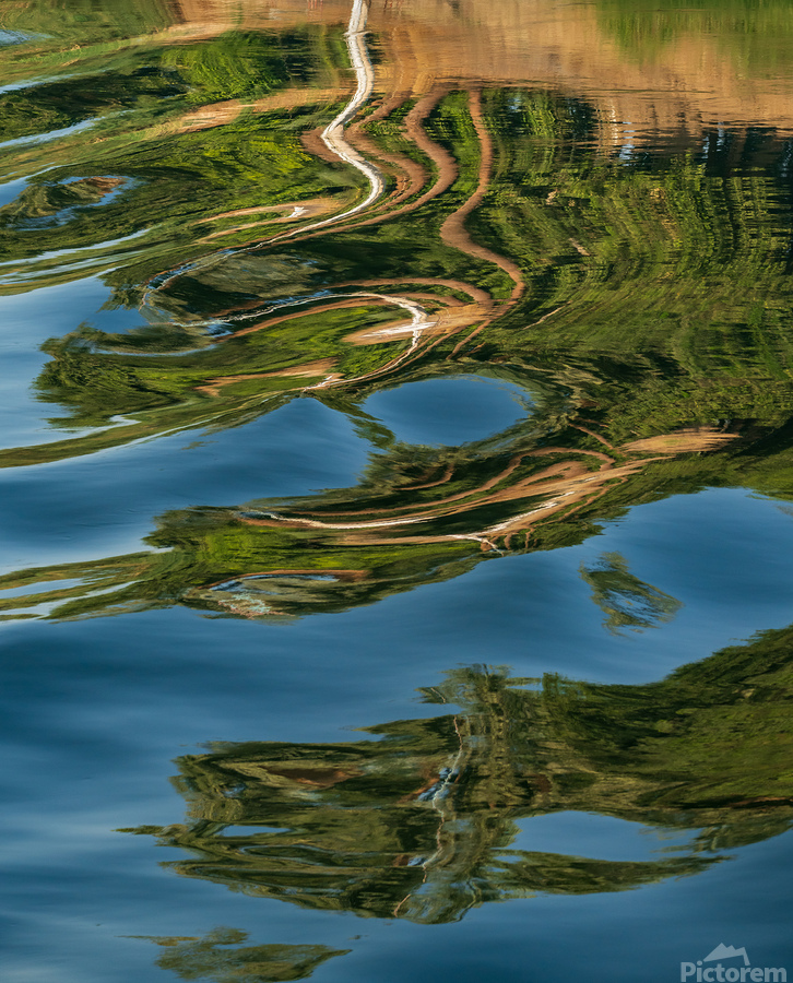 Sailboat on Nile River with ripples in the reflection from passi  Print