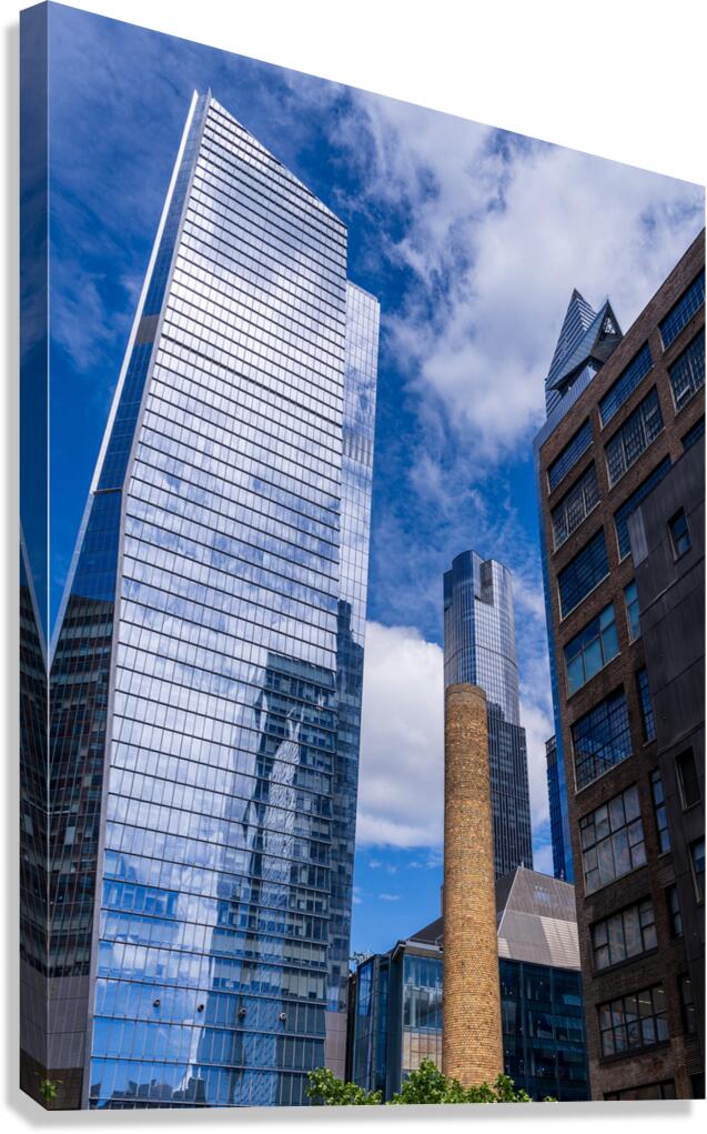 Looking up at modern buildings by brick chimney in Hudson Yards Canvas Print
