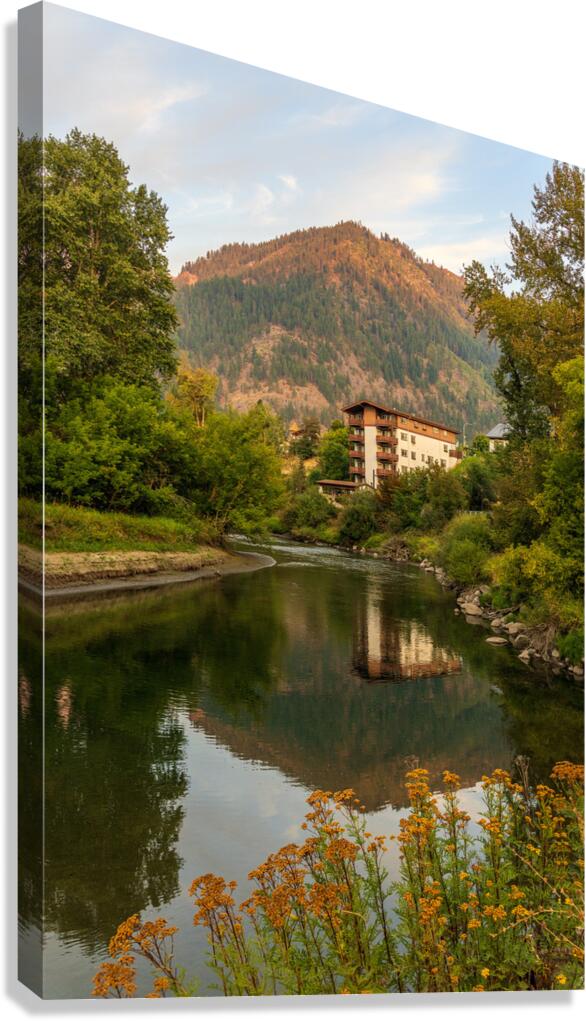 Alpine German apartment building relfects in River Wenatchee in  Canvas Print