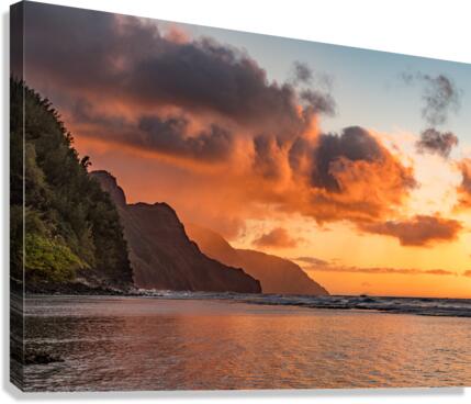 Sunset over the receding mountains of the Na Pali coast of Kauai in Hawaii Canvas Print