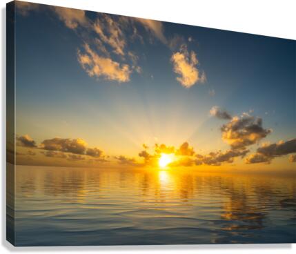 Beautiful sunset reflected in a calm peaceful ocean  Impression sur toile