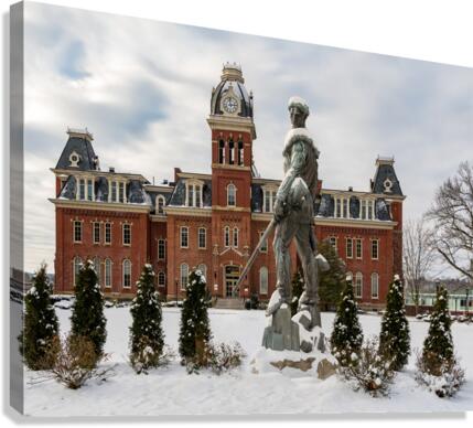 Mountaineer statue against Woodburn Hall Canvas Print