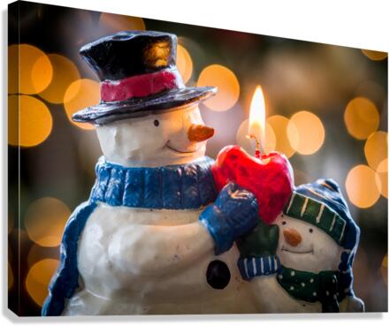 Christmas snowmen candle at xmas Canvas Print