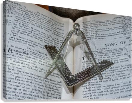 Silver square and compass on Bible for Freemasons  Canvas Print