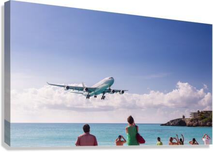 Airplane lands at Princess Juliana airport Canvas Print